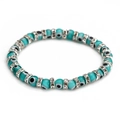 Macro detail of Turkish blue Evil Eye beads and silver rhinestone spacers on elastic bracelet - Cyan Blue