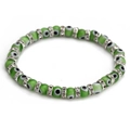 Detail of green evil eye beaded bracelet with silver rhinestone spacers on white background - Green