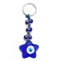 Detail view of a blue star-shaped Evil Eye keychain with small glass beads and metal ring - Star Style (BE808BU04)
