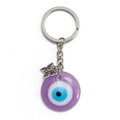 Portachiavi etnico con occhio di Allah viola e ciondolo a farfalla argentato su sfondo bianco - Malocchio Viola (BE1230PU00)