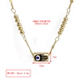 Detail van kleurrijke emaille oog hanger aan een gouden kralen ketting ketting - Donkerblauwe Hamsa Hand Cilinder Hanger Stijl (BE1304GD03)