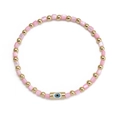 Bohemian evil eye beaded bracelet with pink rectangular beads and gold accents - Pink (BE859GD00)