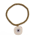 Détail du bracelet élastique doré avec un pendentif carré en émail rose et violet - Carré Géométrique Rose Violet (BE1354GD00)