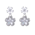 Detail of silver plum blossom drop earrings featuring micro-set zircon crystals - Silver