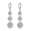 Elegant silver drop earrings with three graduated halo-set cubic zirconia crystals - White (White Zirconia Earrings)