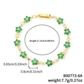 Bracciale floreale in zircone con pietre color smeraldo e catena dorata da 17,5cm - Fiore Verde Smeraldo Oro (B00773-6A)