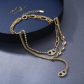 Collana dorata a tre strati con catene a maglie e ciondoli a chicco di caffè con zirconi - Oro