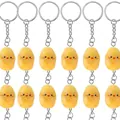 Vari portachiavi a forma di patata con faccine sorridenti e anello in metallo - Patata Gialla