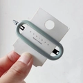Elegant Morandi light grey-green oval hair clip displayed on a branded white card - Grey Green