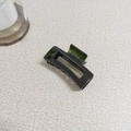 Detailed close-up of dark green jelly resin hair claw with sturdy internal metal spring - Dark Green