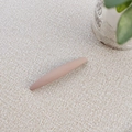 Close-up of a matte dusty pink Morandi spring hair clip with a sleek streamlined design - Orange Pink