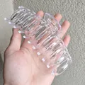 Detail view of a 14cm large transparent acrylic hair claw clip with hollow design - Clear White
