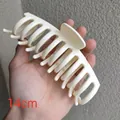 Detail shot of a 14cm milky white large hair claw clip for thick hair styling - Off White