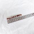 Detailed macro view of an 8.5cm acetate hair clip with vintage marble tortoise patterns - Coffee Floral