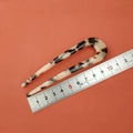 Length measurement of U-shaped acetate hair pin with marble pattern showing 10.5cm on a ruler - Light Tortoise Shell