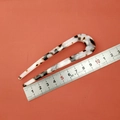 U-shaped hair pin in tortoiseshell acetate pattern showing 11cm length measurement - Black and White Marble