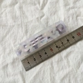 Detail view of purple marbled acetate hair clip showing the 8.5cm length with a ruler - Purple Series