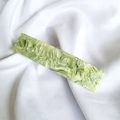 Detail of a large French acetate hair clip with green marble texture on white satin fabric - 5# Light Green System