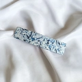Detail of blue marble texture on large acetate hair clip against white silk background - 17# Celadon System