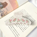 Dettaglio molletta per capelli in acetato bianco marmorizzato con strass anguria rossi - Bianco