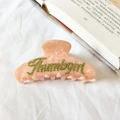 Pinza per capelli rosa marmorizzato con scritte FunnyGirl in strass verdi per donna - Rosa