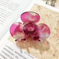 Schicke rosepinke Haarklammer in Blumenform mit glänzendem, perlmuttartigem Finish - Dunkelrot