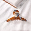 Pinza de pelo grande de acetato con patrón jaspeado marrón y azul y muelle dorado - Sal Marina