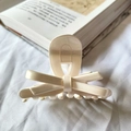 Elegant cream white acetate bow hair claw clip with a glossy pearl finish for women - Satin White