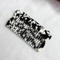 European style acetate hair comb with classic black and white marble pattern design - Black and White Speckled
