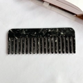 Portable acetate wide-tooth comb featuring elegant black and grey marble texture finish - Black and Gray Floral
