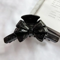 Pinza de pelo en acetato negro con purpurina y diseño de lazo 3D estilo francés - Negro