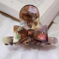 French style bow-shaped acetate hair claw clip with brown and yellow marble pattern - Colorful Purple Texture