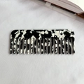 Portable acetate wide-tooth hair comb featuring a classic black and white tortoiseshell pattern - Black and White Speckled