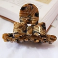Tortoiseshell acetate hair claw clip with bow design in premium marble brown finish - Brown Pattern