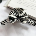 Zebra pattern bow hair claw clip with black and white high-gloss finish for thick hair - Black and White