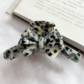 Large acetate hair claw clip with black and white marble bow design for thick hair - Stars Beige