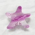 Macro detail of starfish hair claw clip with purple marble pattern and silver glitter finish - Light Purple