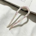 Detail of minimalist U-shaped acetate hair pin with purple marble texture on fabric - Purple White Floral