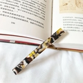 Fermaglio per capelli classico in acetato tartarugato con trama marmorizzata lucida - Stampa Floreale Nera E Marrone 8 Cm