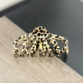 Grande pince à cheveux en acétate avec motif d'étoiles et design de griffes de pieuvre - Tortue Café Foncé