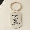 Close-up of Sister I Love You to the Moon and Back engraved stainless steel keychain - Sister (65)