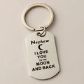 Close-up of stainless steel dog tag keychain for nephew with engraved love message - Nephew (63)