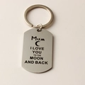 Macro detail of stainless steel keychain with laser engraved MUM and moon message - Mum (k60)
