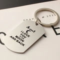 Macro shot of stainless steel rectangular keychain with engraved heart and moon quote - Aunt (k59)