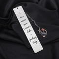 Macro shot of stainless steel bookmark with black cat pendant on black silk fabric - Fuck Off I'm Reading (xk100) / 13*2.6cm