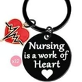 Set of 12 black stainless steel nurse keychains with Nursing is a work of Heart text - Nursing Is A Work Of Heart Style (xk53)
