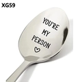 Macro view of polished stainless steel spoon engraved with You're My Person and a heart - You're My Person (XG59)
