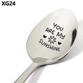 Detailed close-up of polished stainless steel spoon engraved with You Are My Sunshine - You Are My Sunshine (XG24)