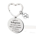 Detalle del llavero de acero inoxidable con aro de corazón y trébol grabado para regalo - Xk85-01 Marca Redonda 30 Mm