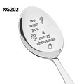 Macro detail of Merry Christmas engraving and festive icons on stainless steel spoon - Christmas Gingerbread Man Style (XG202)